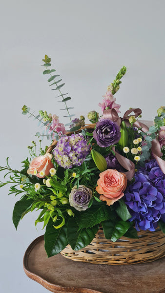 Bright Basket Flower Arrangement.