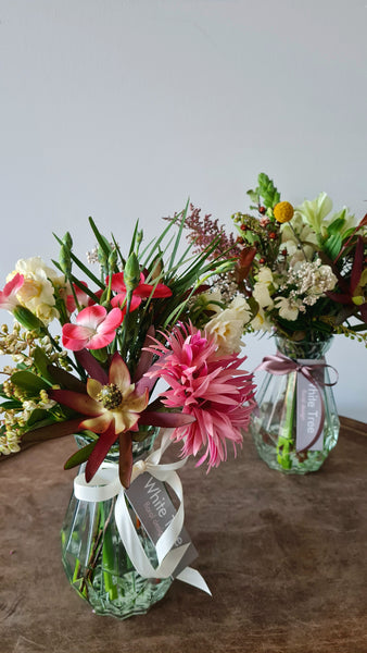 Petite flowers in a sweet vase